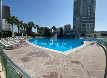 Furnished one-bedroom apartment, 55m², in a new residence 200m from the center of Teje, Mersin ID-12136 фото-10