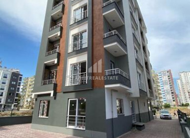 Furnished one-bedroom apartment, 55m², in a new residence 200m from the center of Teje, Mersin ID-12137 фото-1