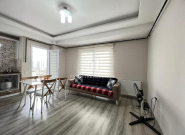 Furnished one-bedroom apartment, 55m², in a new residence 200m from the center of Teje, Mersin ID-12137 фото-2