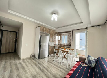 Меблированная двухкомнатная квартира, 55м², в новой резиденции в 200м от центра района Тедже, Мерсин ID-12137 фото-3