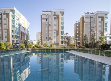Unfurnished three bedroom apartment in a residential residence with a swimming pool, Caglayan, Lara, Muratpasa, Antalya, 155 m2 ID-12143 фото-1