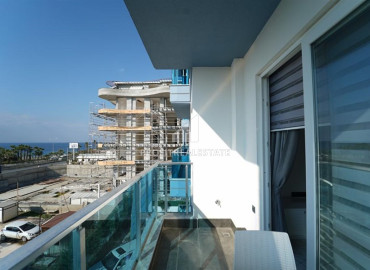 Меблированные двухкомнатные апартаменты, всего в 50 метрах от моря, Каргыджак, Аланья ID-12152 фото-7