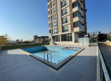 Comfortable apartment 2 + 1, 120m², on a high floor in a residence with a swimming pool in Mersin, Tej. ID-12156 фото-1