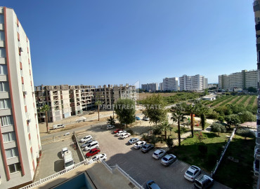 Ergonomic one-bedroom apartment, 55m², on a high floor in a new residence in the Tomyuk area, Mersin ID-12157 фото-11