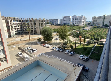Ergonomic one-bedroom apartment, 55m², on a high floor in a new residence in the Tomyuk area, Mersin ID-12157 фото-13