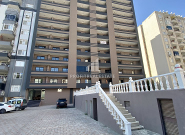 Эргономичная двухкомнатная квартира, 55м², на высоком этаже в новом комплексе в районе Томюк, Мерсин ID-12157 фото-16