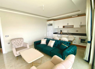 Elegant two bedroom apartment 90m2 on the first line, with panoramic sea views in Mahmutlar, Alanya ID-12158 фото-3