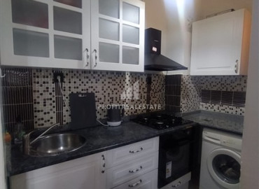 Inexpensive furnished apartment 2 + 1, 200 meters from the sea in the center of Mahmutlar, Alanya ID-12160 фото-2