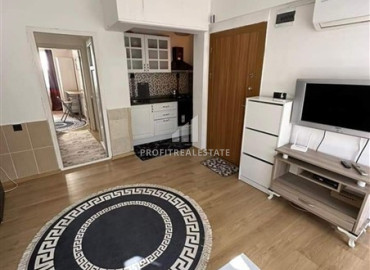 Inexpensive furnished apartment 2 + 1, 200 meters from the sea in the center of Mahmutlar, Alanya ID-12160 фото-9