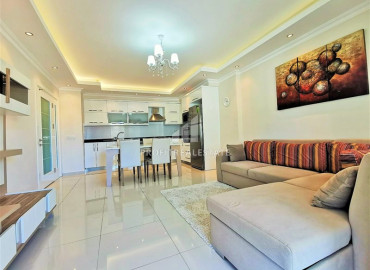 Furnished apartment 1 + 1, 60m² in a residence with a swimming pool 250m from the sea in Alanya Oba ID-9930 фото-2