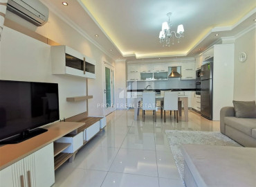 Furnished apartment 1 + 1, 60m² in a residence with a swimming pool 250m from the sea in Alanya Oba ID-9930 фото-4