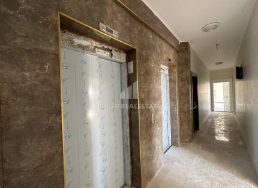 Двухкомнатная квартира с чистовой отделкой, без мебели, в 300 метрах от моря, в новостройке в Демирташе, Аланья ID-12180 фото-14