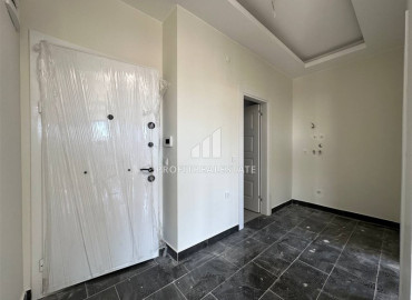 Двухкомнатная квартира с чистовой отделкой, без мебели, в 300 метрах от моря, в новостройке в Демирташе, Аланья ID-12180 фото-16