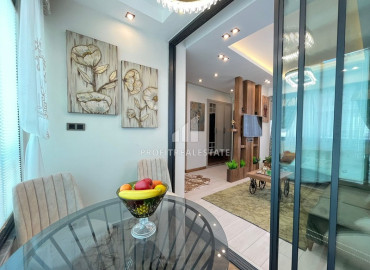 Элегантная квартира с одной спальней, 55м², в новом комплексе с бассейном в центре Мерсина, Енишехир ID-12184 фото-11
