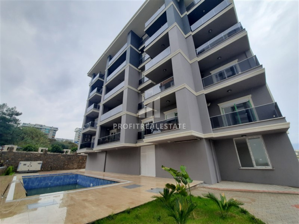 Недорогие двухкомнатные апартаменты, в новой резиденции с бассейном, Авсаллар, Аланья, 55 м2 ID-12198 фото-1