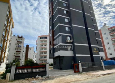 Новая двухкомнатная квартира, 55м², с чистовой отделкой в газифицированном комплексе, в центре Мезитли, Мерсин ID-12307 фото-1