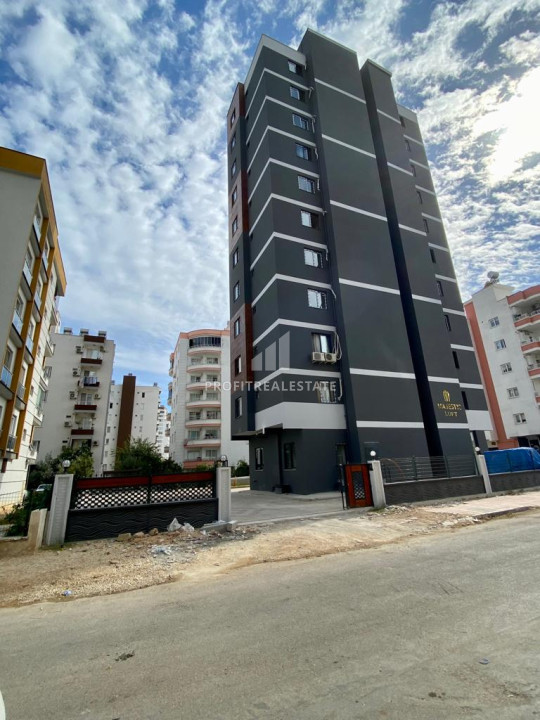 Новая двухкомнатная квартира, 55м², с чистовой отделкой в газифицированном комплексе, в центре Мезитли, Мерсин ID-12307 фото-1