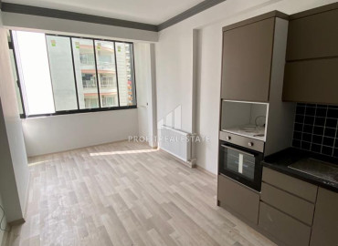 Новая двухкомнатная квартира, 55м², с чистовой отделкой в газифицированном комплексе, в центре Мезитли, Мерсин ID-12307 фото-5