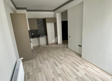 Новая двухкомнатная квартира, 55м², с чистовой отделкой в газифицированном комплексе, в центре Мезитли, Мерсин ID-12307 фото-6