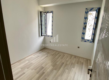 Новая двухкомнатная квартира, 55м², с чистовой отделкой в газифицированном комплексе, в центре Мезитли, Мерсин ID-12307 фото-8