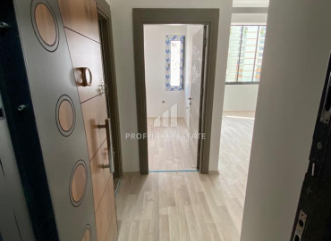 Новая двухкомнатная квартира, 55м², с чистовой отделкой в газифицированном комплексе, в центре Мезитли, Мерсин ID-12307 фото-9