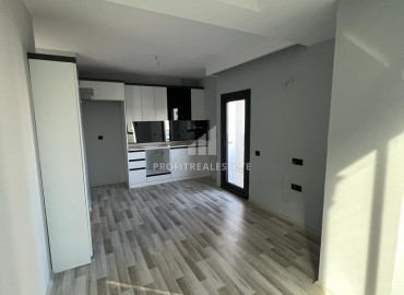 Новая двухкомнатная квартира, 55м², с отличным расположением в микрорайоне Мезитли, Мерсин ID-12321 фото-2