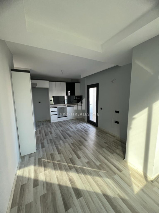 Новая двухкомнатная квартира, 55м², с отличным расположением в микрорайоне Мезитли, Мерсин ID-12321 фото-2