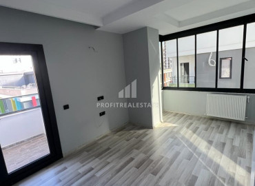 Новая двухкомнатная квартира, 55м², с отличным расположением в микрорайоне Мезитли, Мерсин ID-12321 фото-3