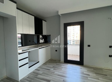 Новая двухкомнатная квартира, 55м², с отличным расположением в микрорайоне Мезитли, Мерсин ID-12321 фото-4