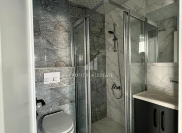 Новая двухкомнатная квартира, 55м², с отличным расположением в микрорайоне Мезитли, Мерсин ID-12321 фото-10