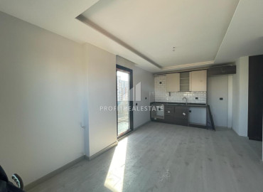 Новая квартира с двумя спальнями, 100м², в малоквартирном газифицированном комплексе в Енишехир, Мерсин ID-12323 фото-2