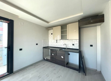 Новая квартира с двумя спальнями, 100м², в малоквартирном газифицированном комплексе в Енишехир, Мерсин ID-12323 фото-3