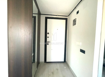 Новая квартира с двумя спальнями, 100м², в малоквартирном газифицированном комплексе в Енишехир, Мерсин ID-12323 фото-7