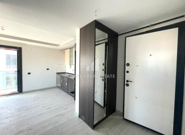 Новая квартира с двумя спальнями, 100м², в малоквартирном газифицированном комплексе в Енишехир, Мерсин ID-12323 фото-9