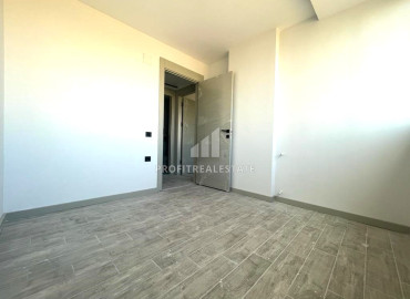 Новая квартира с двумя спальнями, 100м², в малоквартирном газифицированном комплексе в Енишехир, Мерсин ID-12323 фото-12