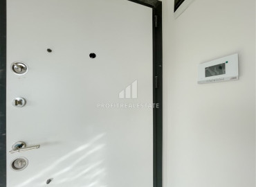 Новая двухкомнатная квартира 50 м2 в новостройке, с чистовой отделкой, сантехникой, без мебели, в Оба, Аланья ID-12328 фото-10