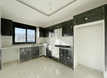 Новая двухкомнатная квартира 50 м2 в новостройке, с чистовой отделкой, сантехникой, без мебели, в Оба, Аланья ID-12328 фото-13