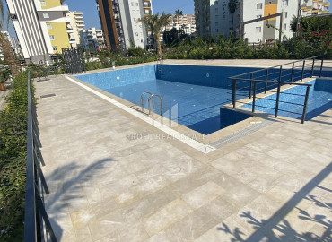 New apartment 2 + 1, 110m², in a gasified premium class residence 250m from the sea in Tej, Mersin ID-12352 фото-12