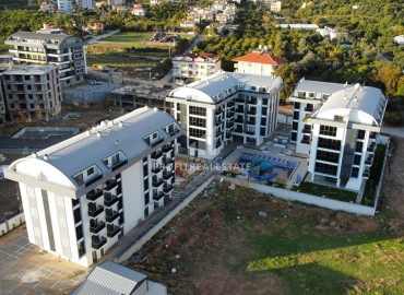 New one-bedroom apartment, with stylish furniture, in Oba, Alanya, 55 m2 ID-12370 фото-1