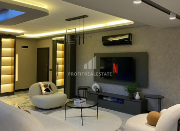 Luxury two bedroom penthouse, 110m², with a designer interior on the beach in Mersin, Tomyuk ID-12374 фото-10