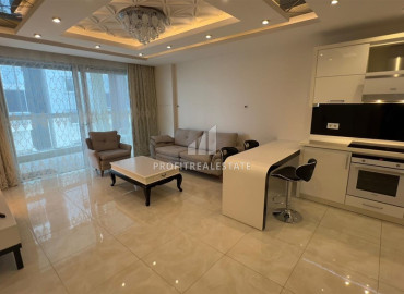 Меблированная квартира 1+1, на первой береговой линии, с застекленным балконом и теплыми полами, в центре  Махмутлара, Аланья ID-12391 фото-2