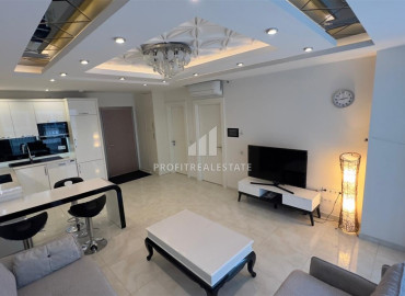 Меблированная квартира 1+1, на первой береговой линии, с застекленным балконом и теплыми полами, в центре  Махмутлара, Аланья ID-12391 фото-7