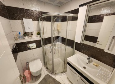 Фешенебельная трехкомнатная квартира с авторским интерьером и застекленным балконом в Махмутларе, Аланья ID-12394 фото-16