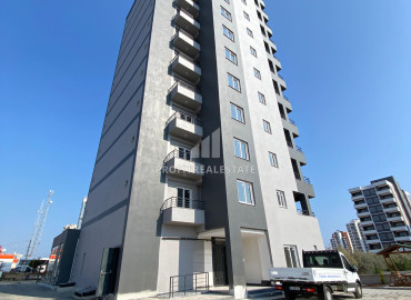 Трехкомнатная квартира, 110м², в газифицированном комплексе на этапе ввода в эксплуатацию в Тедже, Мерсин ID-12435 фото-1