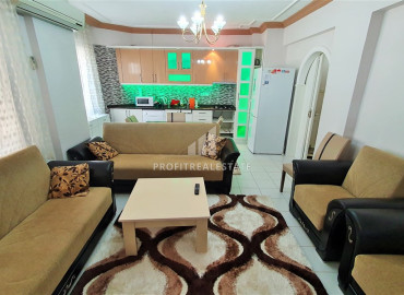 Недорогая меблированная квартира с двумя спальнями, 105м², в доме городского типа в районе Махмутлар, Алания ID-12451 фото-2