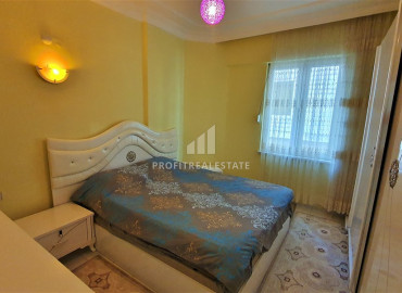 Недорогая меблированная квартира с двумя спальнями, 105м², в доме городского типа в районе Махмутлар, Алания ID-12451 фото-7