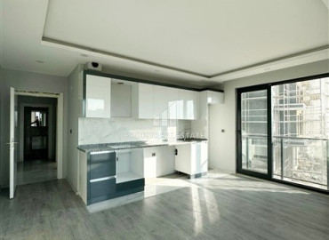 Новая трехкомнатная квартира в районе Алтынташ, Анталия, в доме с бассейном, 76 м2 ID-12475 фото-2
