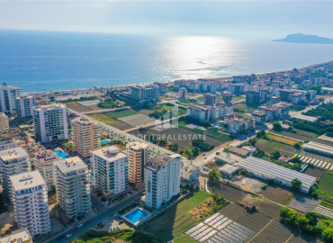 Furnished one-bedroom apartment, 67m², on a high floor in the western part of Mahmutlar, 500m from the sea ID-12492 фото-1