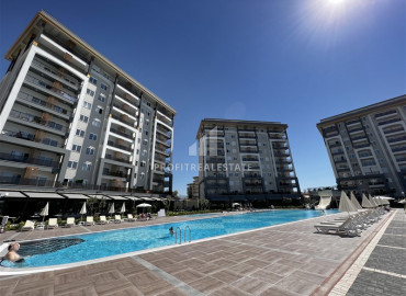 Симпатичная новая двухкомнатная квартира, 47м² в элитном комплексе в 900м от пляжа Инжекум в Авсалларе ID-12502 фото-1
