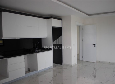 One-bedroom apartment, 76m², on the high floor of an elite new building in Mahmutlar, 500m from the sea, Alanya ID-12514 фото-2